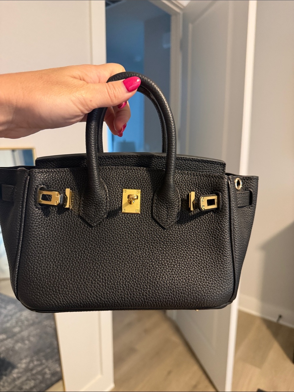 Black Pebbled Leather Top-Handle Bag with Gold Hardware